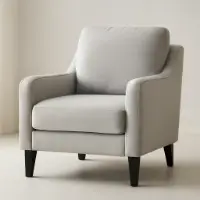 Sillón tapizado gris claro